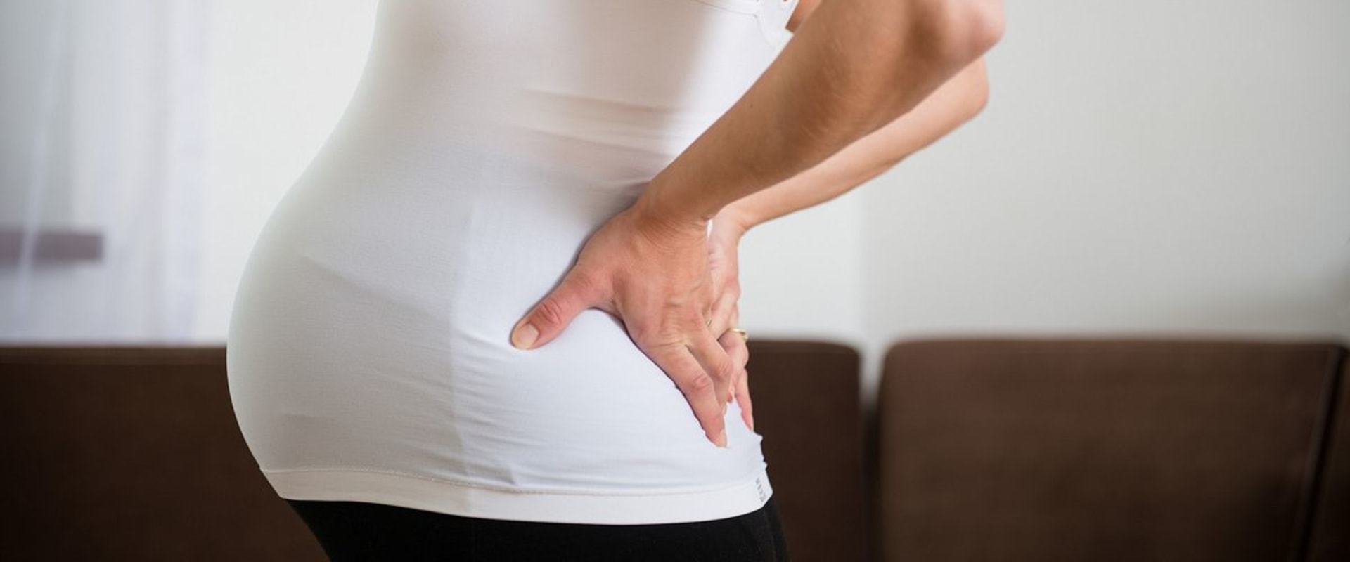 Why back pain in early pregnancy?