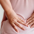 Why back pain occurs in female?