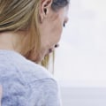 What can cause back pain in a woman?